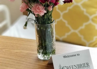 Welcome card and flowers